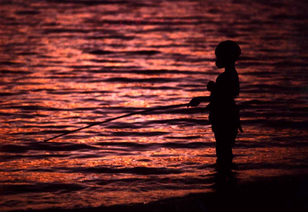 Vissers op het Malawimeer bij zonsopgang